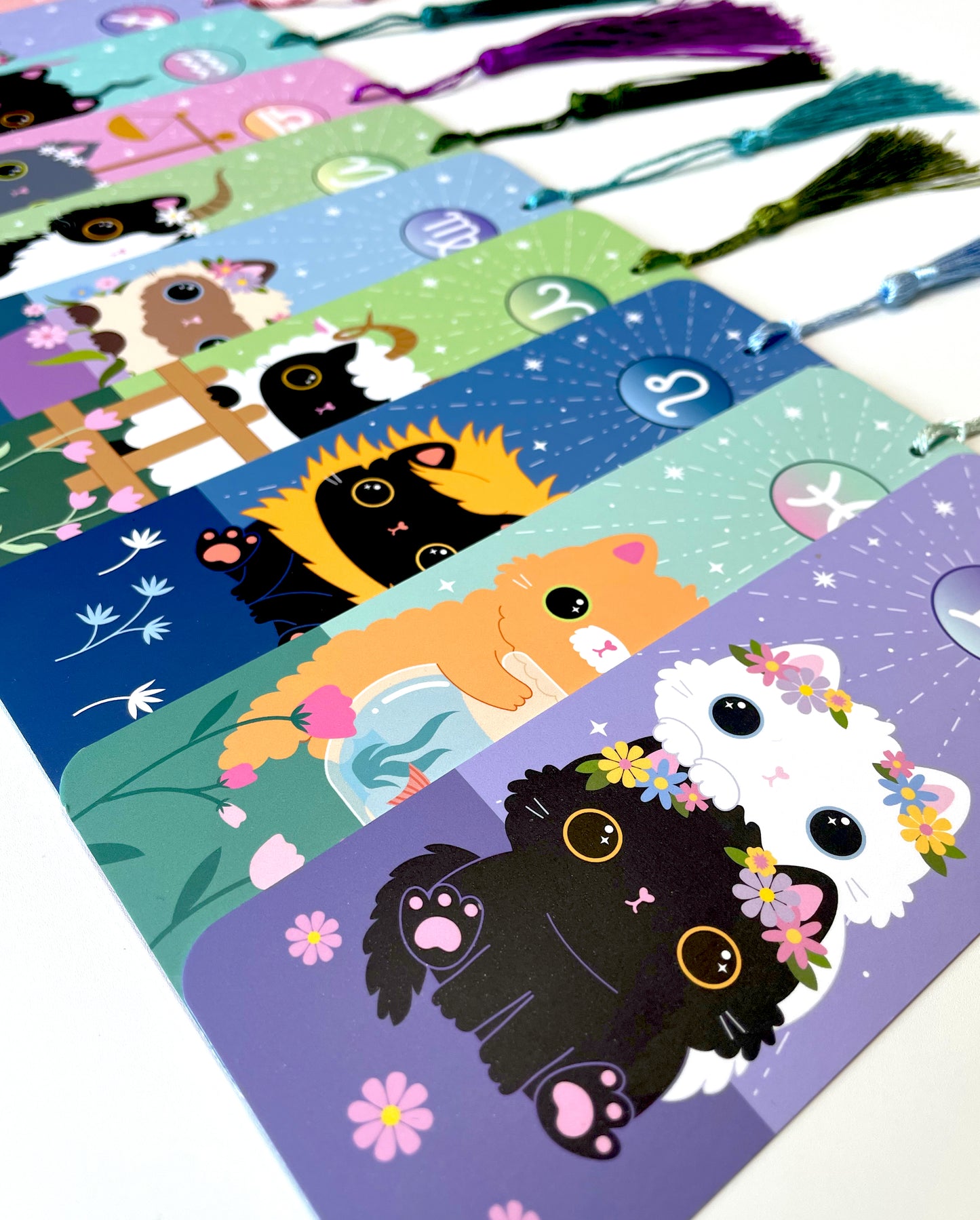 All star sign cat bookmarks, including Taurus, with cute tassels and double-sided designs, perfect for cat lovers and astrology fans