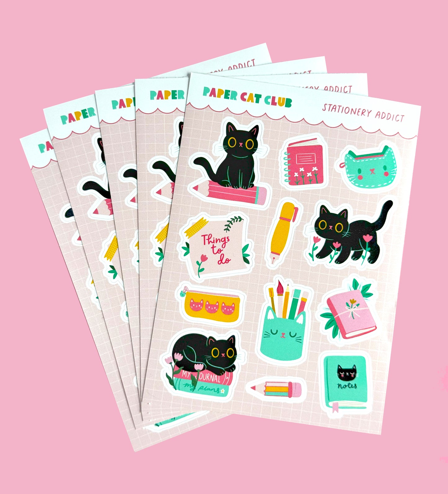 A6 sticker sheet with various cute cat-themed stationery item stickers.
