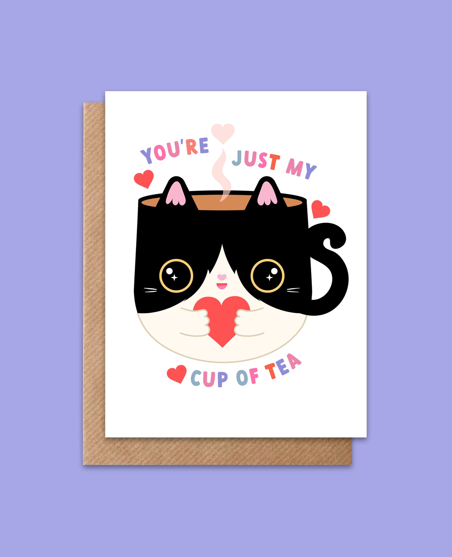 Valentine’s Day card featuring a kawaii cat mug with hearts and the phrase 'You're Just My Cup of Tea,' printed on thick 350gsm eco-friendly card stock with a recycled kraft envelope