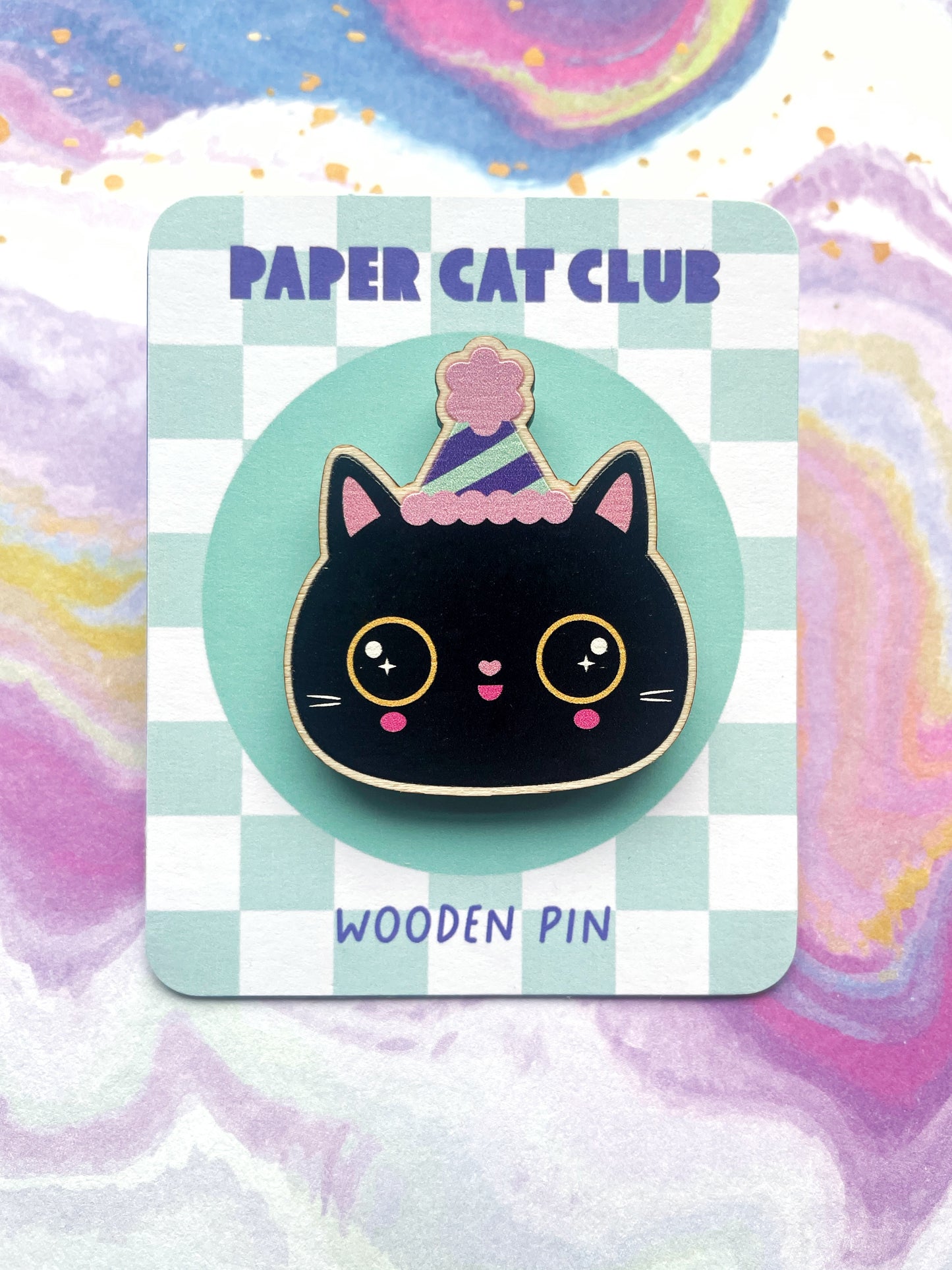 Eco-friendly black cat pin badge with a party hat, made from sustainable wood. Perfect birthday gift for cat lovers