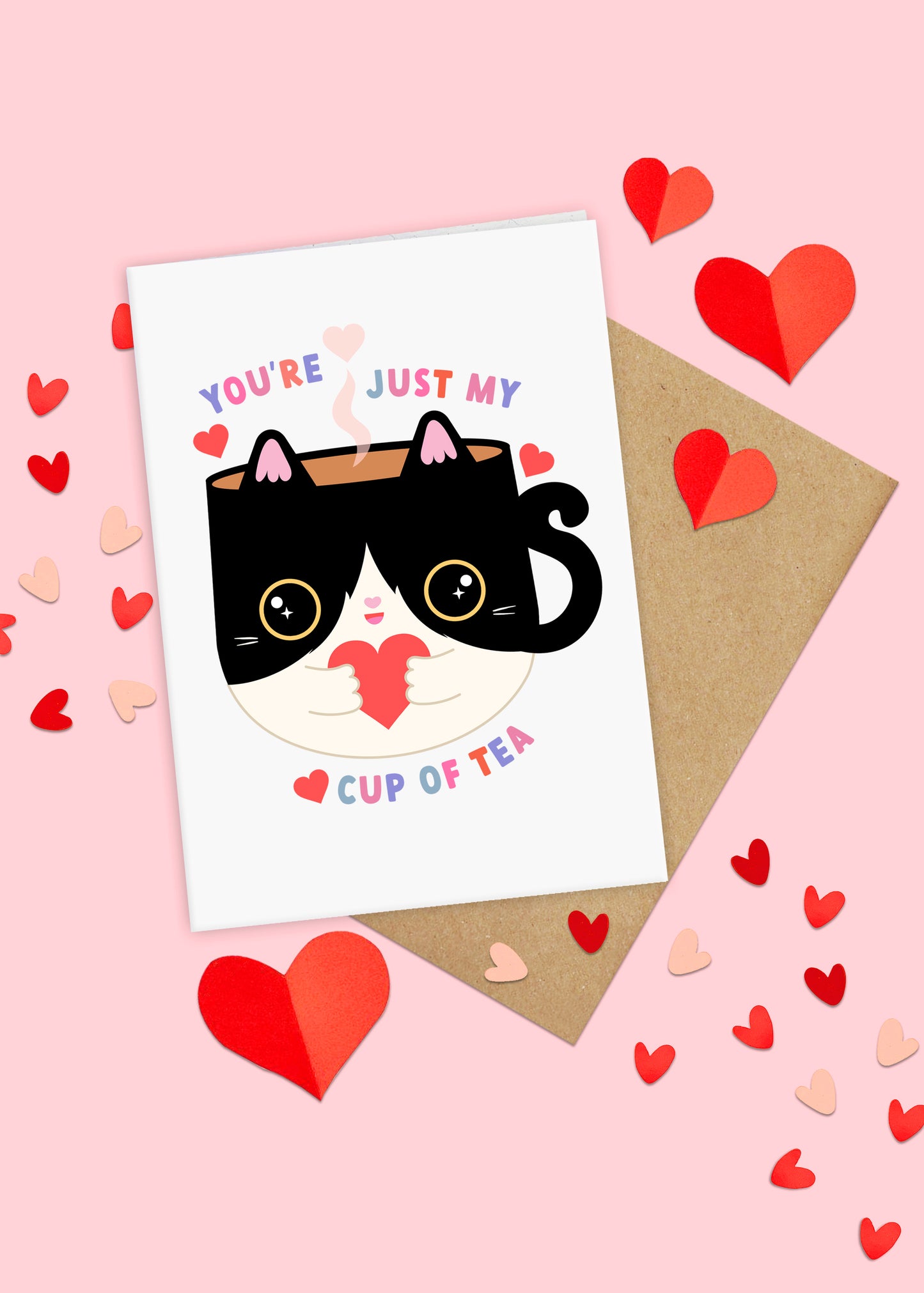 Valentine’s Day card with a kawaii cat mug and hearts, reading 'You're Just My Cup of Tea,' displayed on a heart-patterned background, perfect for cat lovers and Galentine's gifts