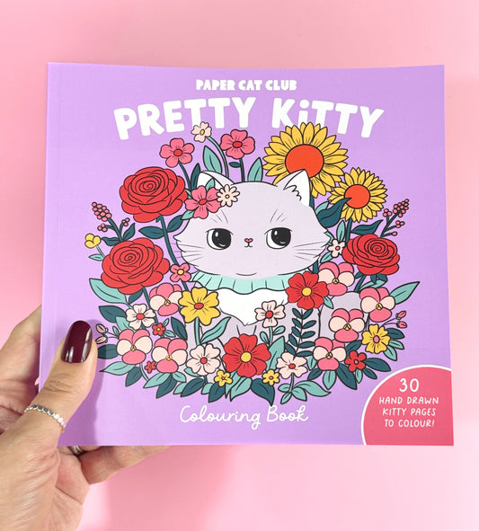 Colouring book featuring hand-drawn kawaii cat designs on thick, high-quality 200gsm paper.