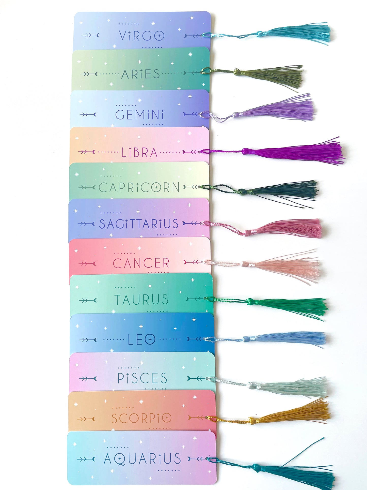 The reverse of the zodiac bookmarks with colourful gradients and names of each star sign