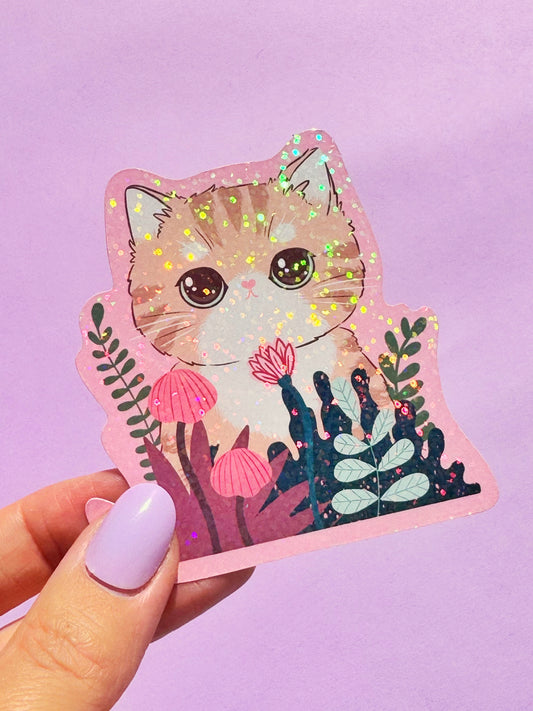 Close-up of a high-quality, water-resistant vinyl sticker showcasing a cute striped cat surrounded by a vibrant arrangement of pink blossoms and green foliage. This durable and scratch-resistant decal is ideal for personalising laptops, water bottles, and journals with a touch of floral feline sweetness.