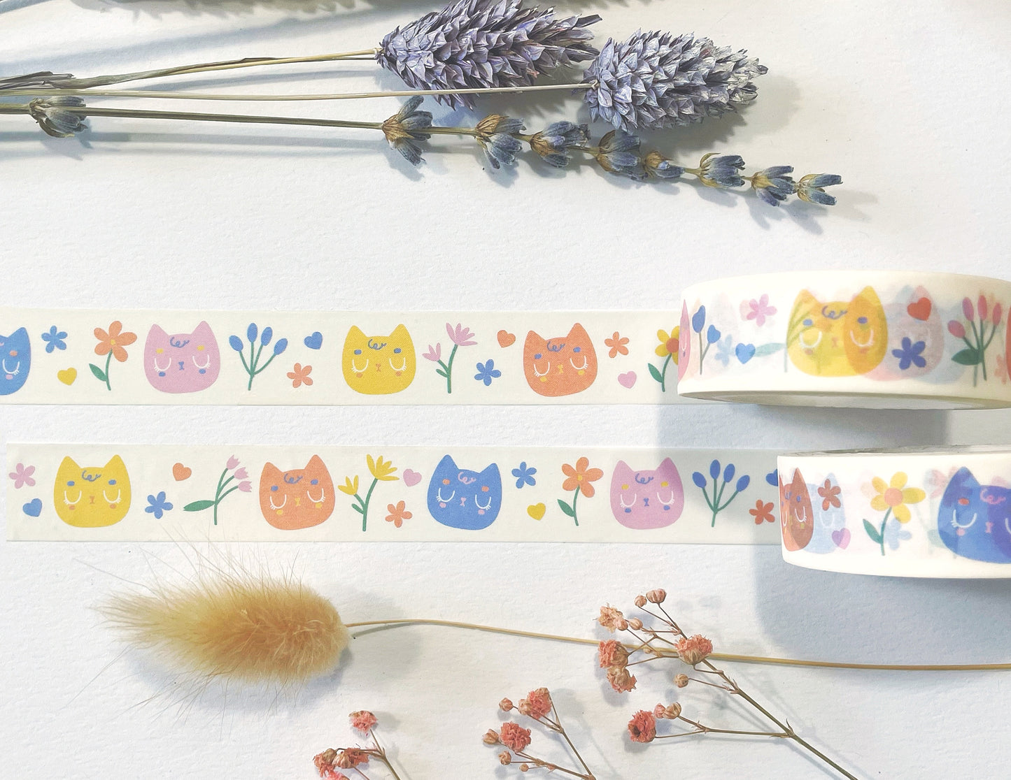 Cream washi tape with a cute cat and floral design, perfect for journaling, bullet journals, and scrapbooking