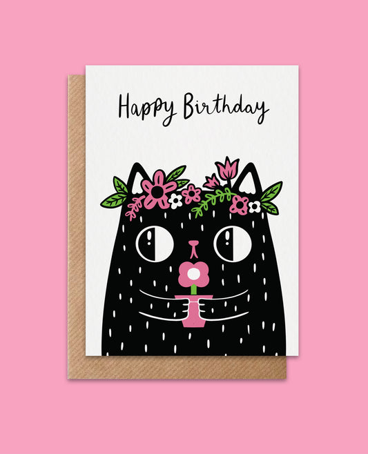 Happy birthday card with cute kawaii black cat holding a flower, perfect for cat lovers and unique birthday greetings