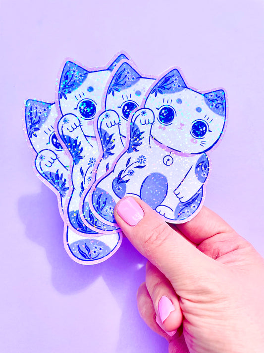 Holographic vinyl sticker featuring a cute lucky cat (Maneki-Neko) design