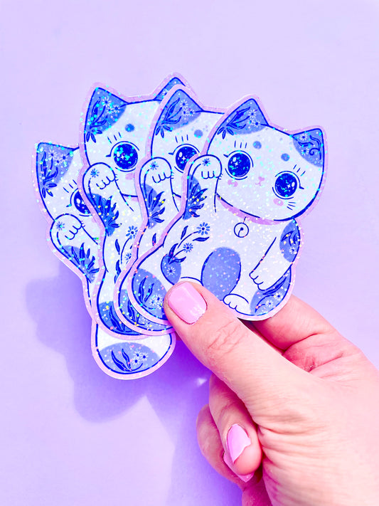 Lucky cat sticker in sparkly holographic vinyl.
