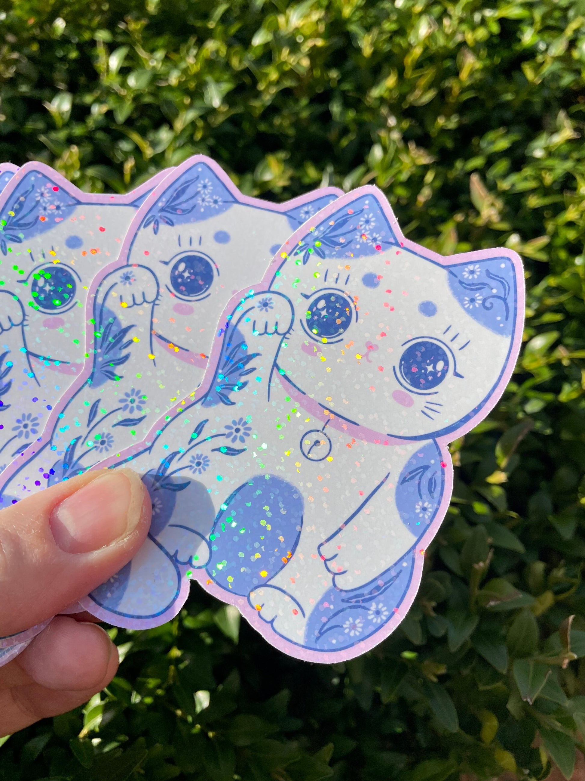 Super Sparkly holographic vinyl sticker in lucky cat design